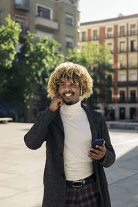 Young man using mobile phone