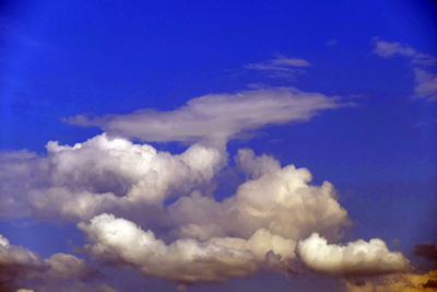 Low angle view of clouds in blue sky