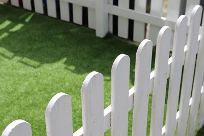 High angle view of picket fence in yard