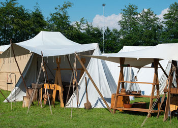 View of tent in field against trees