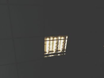 Low angle view of illuminated window