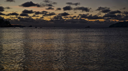 Scenic view of sea against sky at sunset