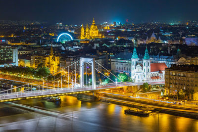 Illuminated buildings in city at night