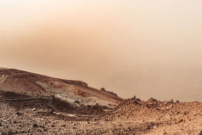 Scenic view of desert against sky