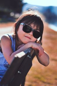 Portrait of little girl wearing sunglasses