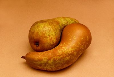 Close-up of fruit against white background