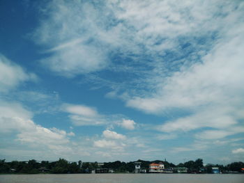 Scenic view of landscape against blue sky