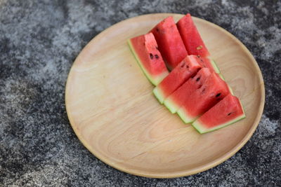 High angle view of chopped slices on cutting board