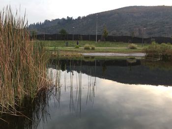 Reflection of clouds in calm lake