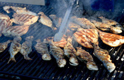 Grilled fish on charcoal