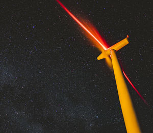 Aerial view of wind turbine at night