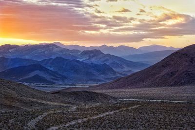 Scenic view of mountains against sky during sunset