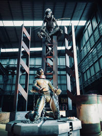 Low angle view of statue outside building