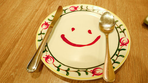 High angle view of birthday cake on table