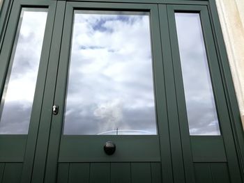 Low angle view of sky seen through window