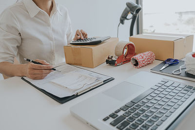 Man using laptop on table