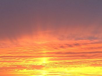 Scenic view of dramatic sky over sea