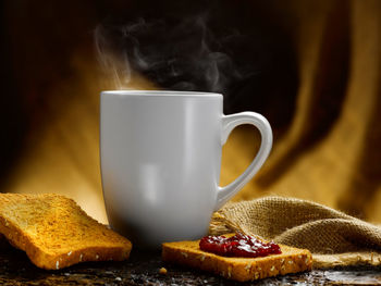 Close-up of coffee cup on table