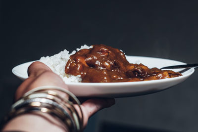 Close-up of olding curry rice in plate / cooking at home in japan