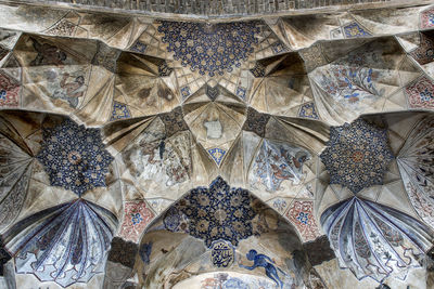 Low angle view of ornate ceiling