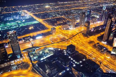 High angle view of illuminated cityscape at night