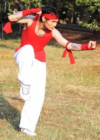 Woman standing on field