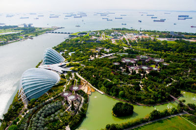 High angle view of trees and buildings against sky