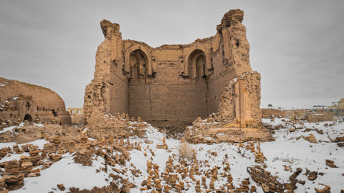 Old ruins of building during winter