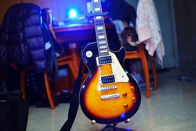 Close-up of guitar at home