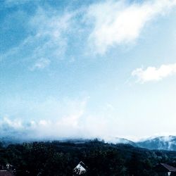 Clouds over mountain range