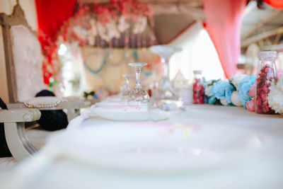 Close-up of wedding rings on table