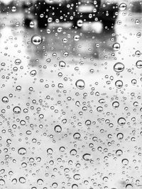 Close-up of water drops on glass