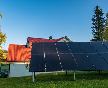 Low angle view of basketball hoop against blue sky