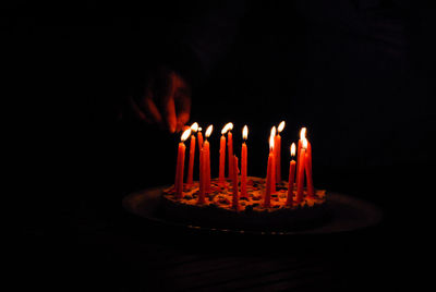 Close-up of fire in dark room