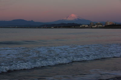 Scenic view of sea against sky during sunset