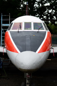 Close-up of airplane on field