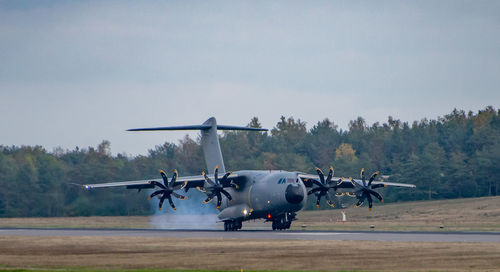 Military helicopter against sky