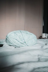 Close-up of bed on table at home