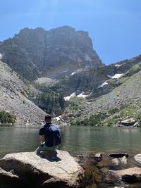 Sitting in the rockys at emerald lake