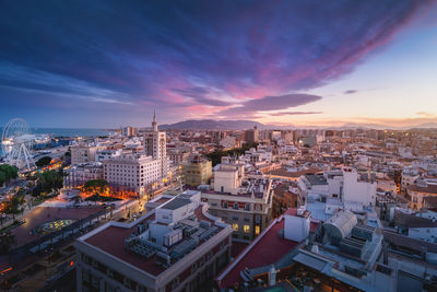 High angle view of townscape against sky during sunset