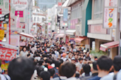 People walking on street in city