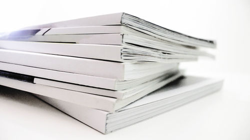 Close-up of books on white background