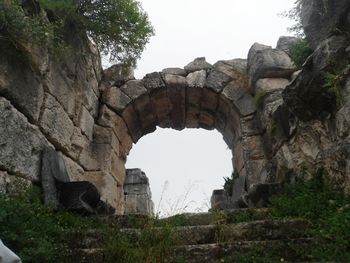 Low angle view of old ruins against clear sky