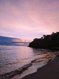 Scenic view of sea against sky at sunset