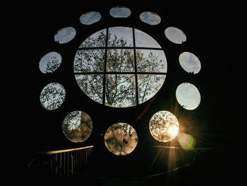 Close-up of electric lamp against black background