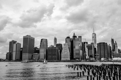 City skyline against cloudy sky