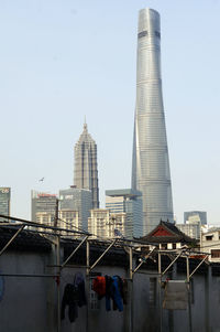 Low angle view of skyscrapers against clear sky