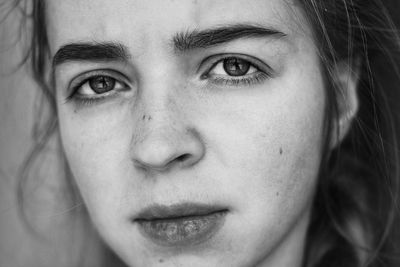 Close-up portrait of young woman