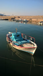 View of boats moored at harbor