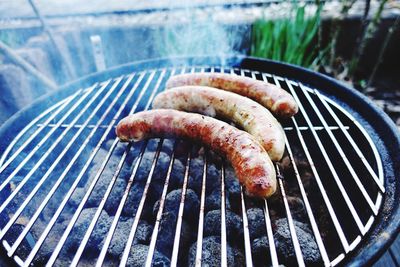 Close-up of meat on barbecue grill